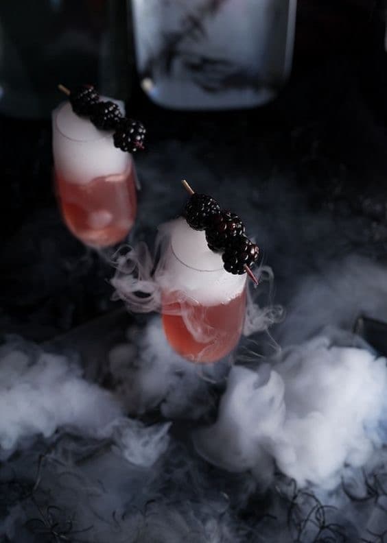 Smoky cocktails with blackberries